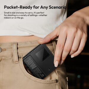 Ulanzi C10RGB held in hand demonstrating compact pocket-sized design with adjustable brightness and color for on-the-go filming