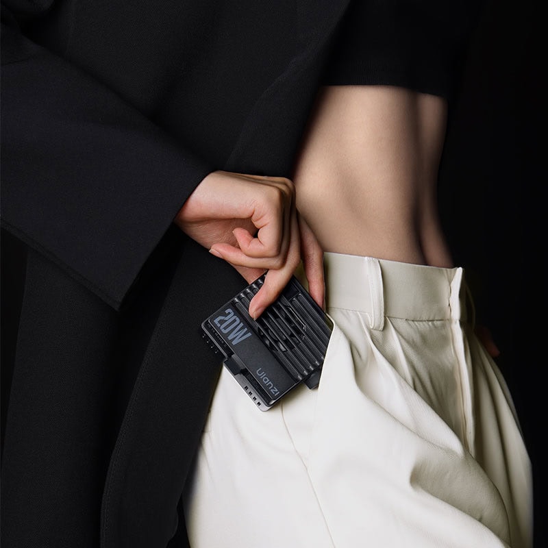 Compact Ulanzi LE20 20W RGB video light held in hand, ideal for content creators and videographers for versatile lighting in various shooting environments.